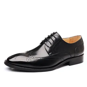 Classic black men's leather brogue shoes with wingtip detailing and formal oxford style.