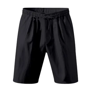 Vista detallada de pantalones cortos de lino negro con cordón ajustable en cintura.