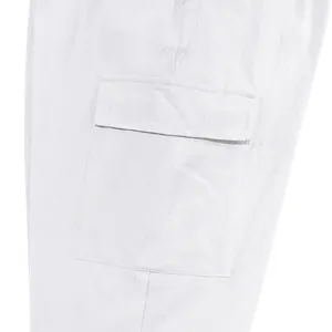 Close-up detail of the side cargo pocket on white linen loose fit men's casual pants