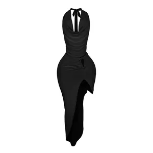 Detail showing black halter cowl neck top and high-slit maxi skirt set on white background