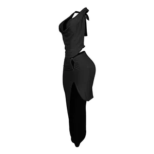 Side view of sexy black halter cowl neck top and high slit skirt set