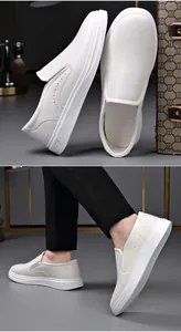 Men's minimalist white loafers for business and casual wear with soft leather finish