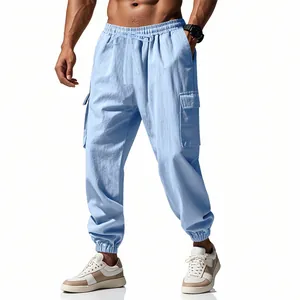 Full view of light blue linen cargo joggers for men in outdoor sports style