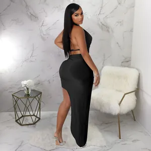 Elegant black two-piece set featuring a halter backless top and sexy high-slit maxi skirt