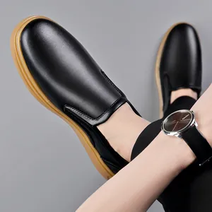 Classic black business casual leather loafers for men featuring gum rubber soles for driving