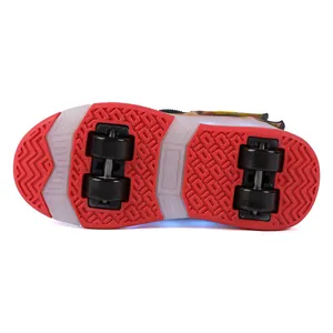 Close-up bottom view of four-wheel roller shoes featuring durable anti-slip red rubber sole