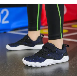 Detail of children's breathable barefoot shoes with flexible soft white soles