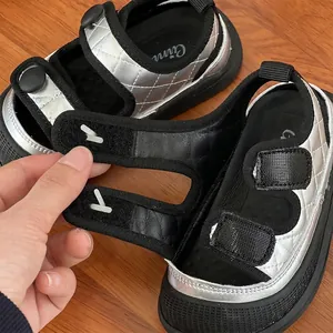 Close-up view showing the adjustable velcro straps on toddler closed-toe summer sandals