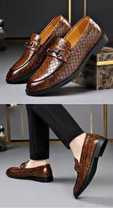 Professional macro shot of men's brown woven leather loafers with metal buckle detail