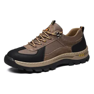 Zijaanzicht van ademende leren wandelschoenen voor heren in bruin en zwart outdoor