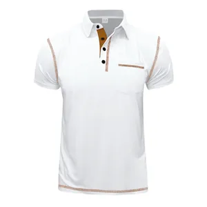 Detailed view of white men's polo shirt with brown contrast stitching and chest pocket