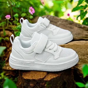 Baskets classiques en cuir blanc pour enfants, design bas imperméable pour le sport