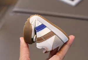 Close-up detail showing the high flexibility and soft sole of baby toddler walking shoes