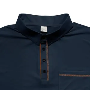 Close-up detail of a navy blue men's polo shirt collar with size M label and pocket.