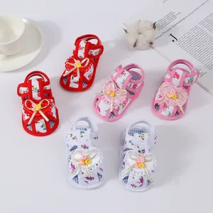 Floral baby girl sandals with bow details and soft breathable soles for infants 0-1 year