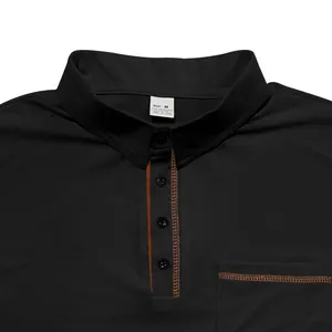 Macro detail of men's black polo shirt showing collar and orange contrast stitching.
