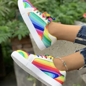 Vibrant women's rainbow gradient casual sneakers for trendy street style and comfort.