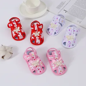Cute floral baby sandals with decorative butterfly pearls and soft non-slip soles for infants