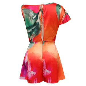 Detailed back view of a sexy floral print romper featuring an open back and zipper closure