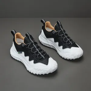 Baskets élégantes en cuir noir et blanc pour hommes avec semelle épaisse pour randonnée