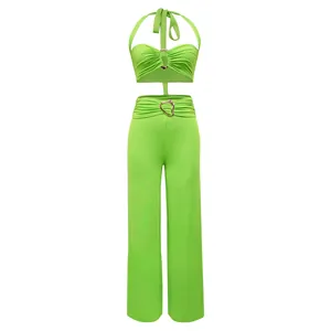 Full front view of neon green halter top and wide leg pants set with heart buckles