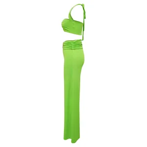 Side view of sexy lime green halter crop top and long skirt two-piece clothing set