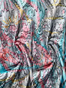 Close-up detail of retro paisley print fabric for a stylish and elegant vintage maxi dress