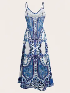 Detailed front view of a stylish bohemian paisley print maxi dress with thin spaghetti straps