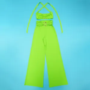 Lime green halter top and wide-leg pants two-piece set with decorative gold heart buckles