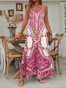 Detailed front view of stylish summer camisole maxi dress featuring pink paisley print