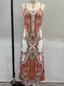 Elegant retro paisley print camisole maxi dress with full swing skirt on dress form