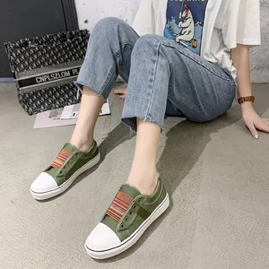 Stylish green canvas board shoes for women featuring colorful elastic bands and thick soles