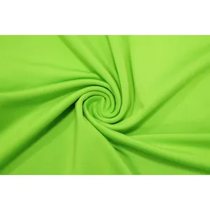 Detailed macro shot showcasing the high-quality texture of neon green stretch knit fabric