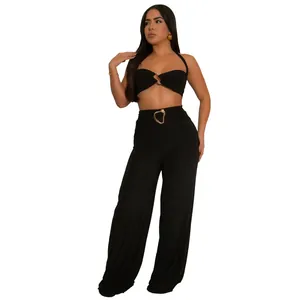 Sexy black halter neck two-piece set with decorative gold buckles and wide-leg pants