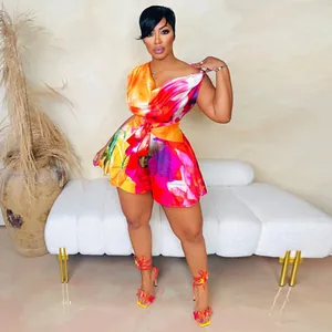 Detail of a colorful abstract print on a sexy off-shoulder casual romper for women