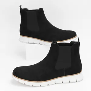 Men's classic black suede Chelsea boots featuring comfortable lightweight white soles