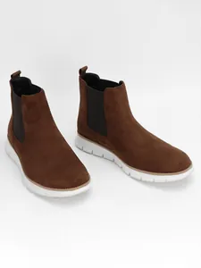 Classic men's brown suede Chelsea boots featuring comfortable lightweight white soles detail