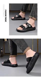 Detailed side view of men's black buckle slides with thick foam sole for summer wear