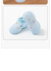 Close-up of breathable light blue mesh baby walking shoes featuring non-slip soft rubber soles