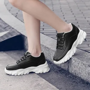 Stylish black and white chunky dad sneakers with 8cm platform sole for women and men