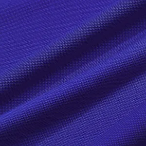Close-up macro texture of high-quality breathable blue mesh fabric for sport polo shirts