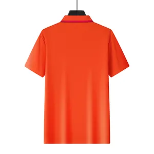 Back view of a vibrant orange men's mesh polo shirt with a stylish red collar accent.