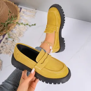 Yellow suede platform loafers for women with thick soles in a retro British style