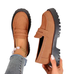 Women's British style chunky platform loafers in tan suede with thick black soles