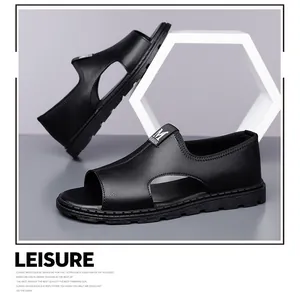 Macro view of men's black leather leisure sandals with breathable cut-outs.
