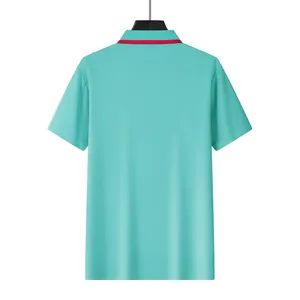 Back view of a men's quick-dry teal mesh polo shirt with a red striped collar detail