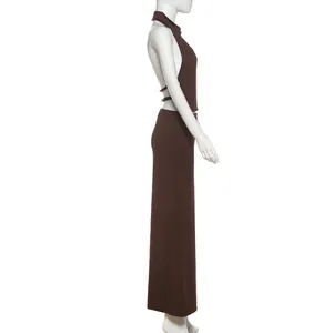 Side view of dark brown halter backless top and slim fit maxi skirt set on mannequin
