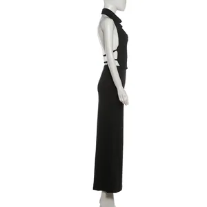 Side view detail of a black sexy halter neck backless top and slim maxi skirt set.