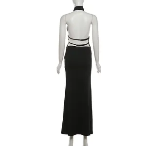 Detailed back view of a sexy black halter backless top and slim bodycon maxi skirt set
