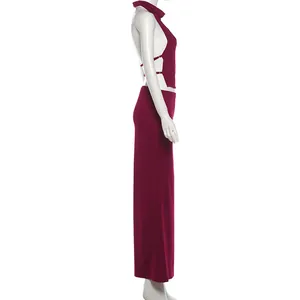 Side view of sexy burgundy halter backless top and matching slim long skirt set